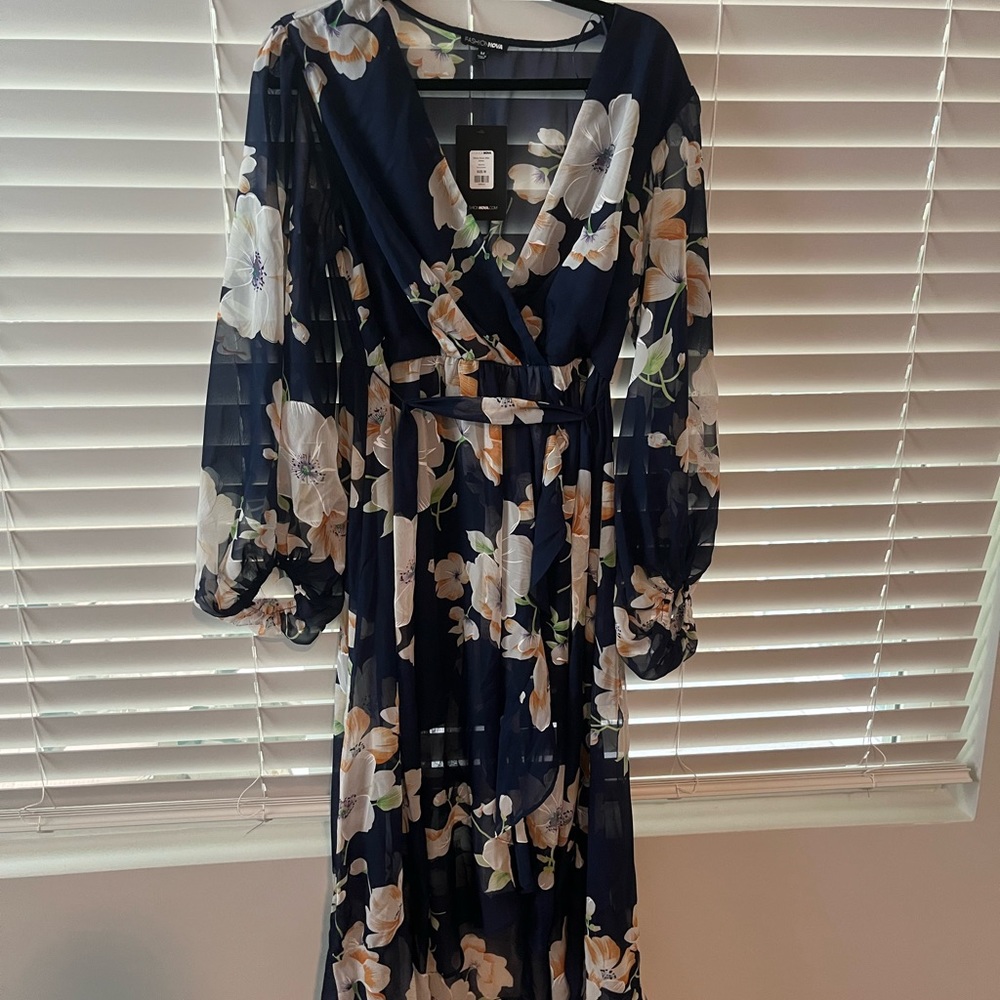 Beautiful midi dress with a sheer overlay.